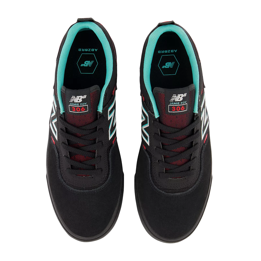 New Balance Numeric 306 Jamie Foy Black / Electric Red Shoes The 306, Jamie Foy’s signature model for New Balance Numeric, is built to take all the abuse that Jamie can throw at it. This model features a unique visible rubber underlay that reinforces the suede and mesh upper, a low-profile vulcanized outsole for board feel, and a custom molded EVA insole for comfort. A shoe that rises to the highest demands of current street skateboarding and comes out smilin'. Top