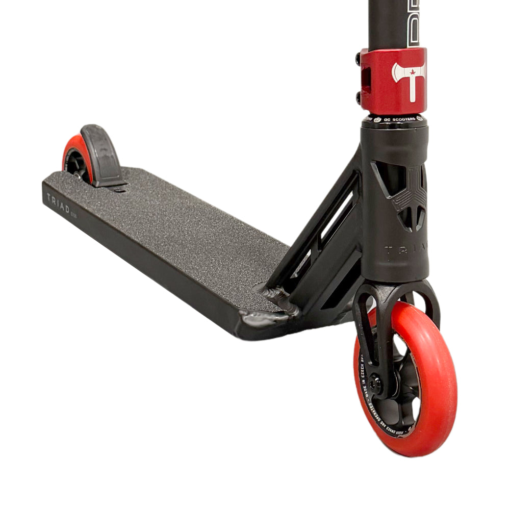 The Trinyl Custom Complete Pro Scooter Close Up With Triad Psychic V2 Deck And Vinyl Wheels