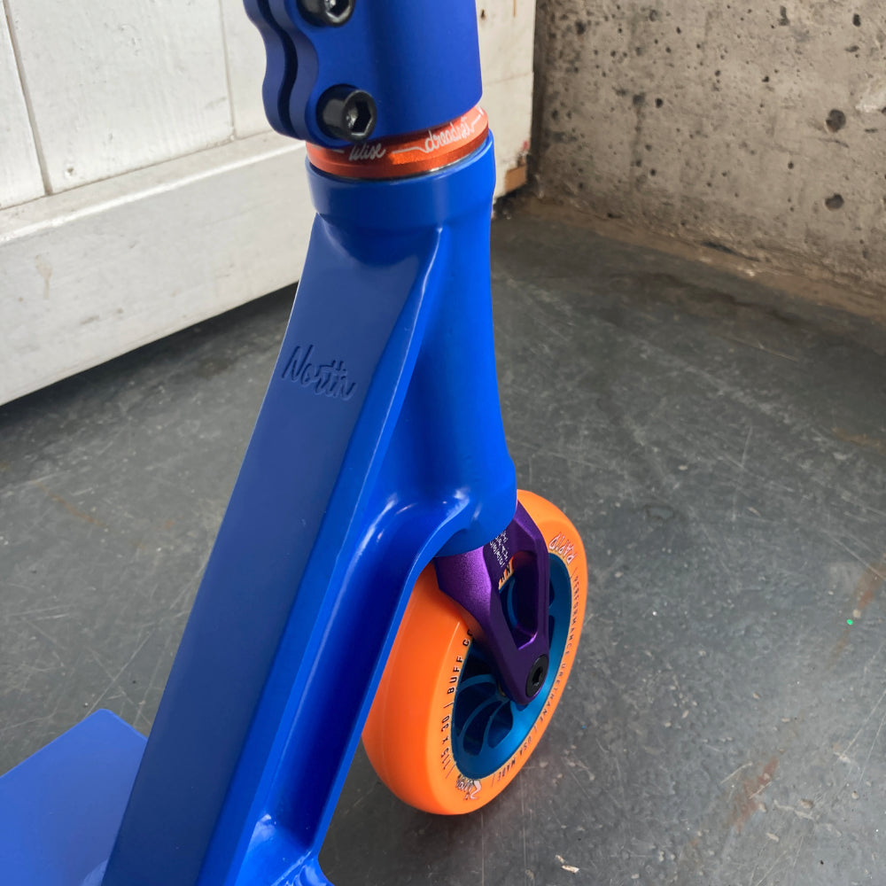 Tutty Fruity Custom Freestyle Scooter Freshness as a scooter and it's that one. Big, strong, flashy, everything you'll need to show off at your local street spots. From the North Scooters Horizon deck to the River Rapids 115x30mm, this scooter screams STREET. We also added little off innovations with the Triad TUC fork and Felon butted bars to save weight where you can. Neck