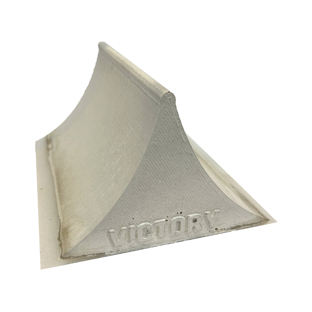 The Victory Spine&nbsp;is the perfect platform for mastering finger skate tricks! Made in Quebec from concrete and epoxy, this homemade spine&nbsp;is guaranteed to provide you with hours of exhilarating fun