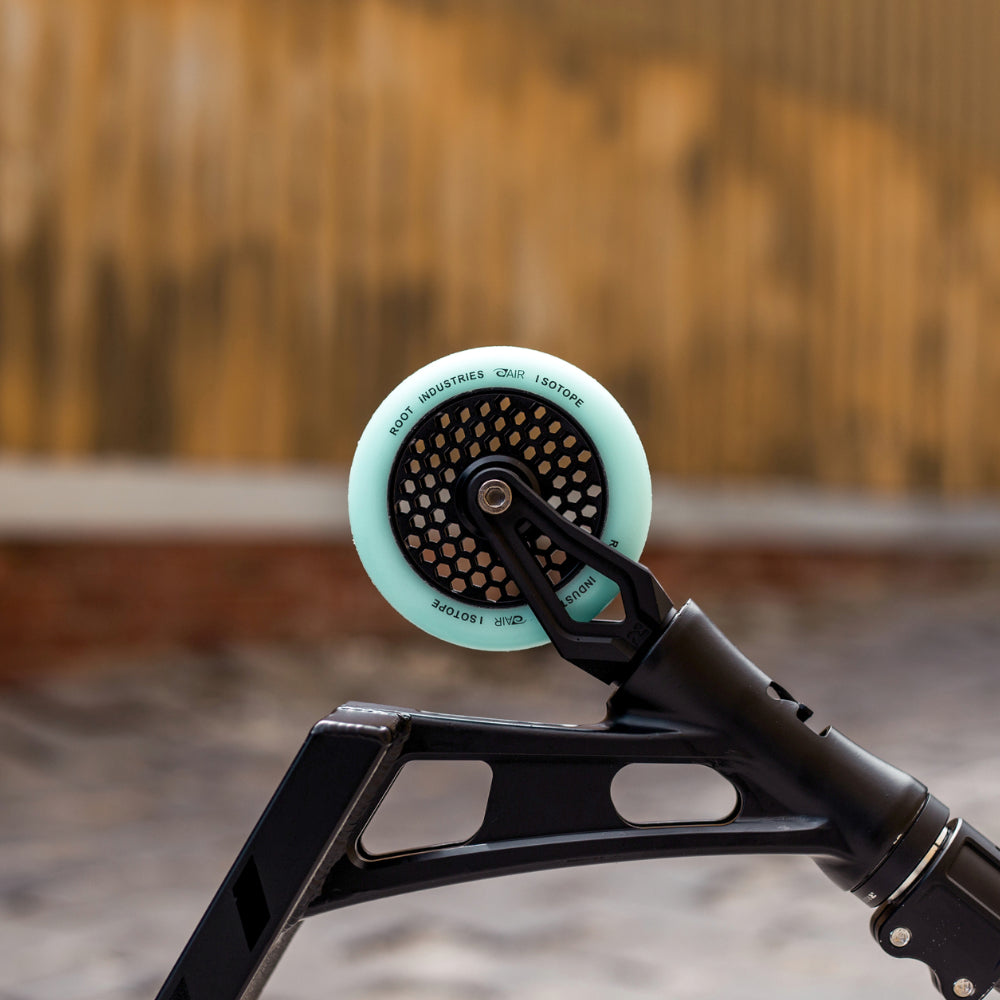Root Industries Honeycore Isotopes Glow In The Dark 110mm Scooter Wheels Posed On Scooter