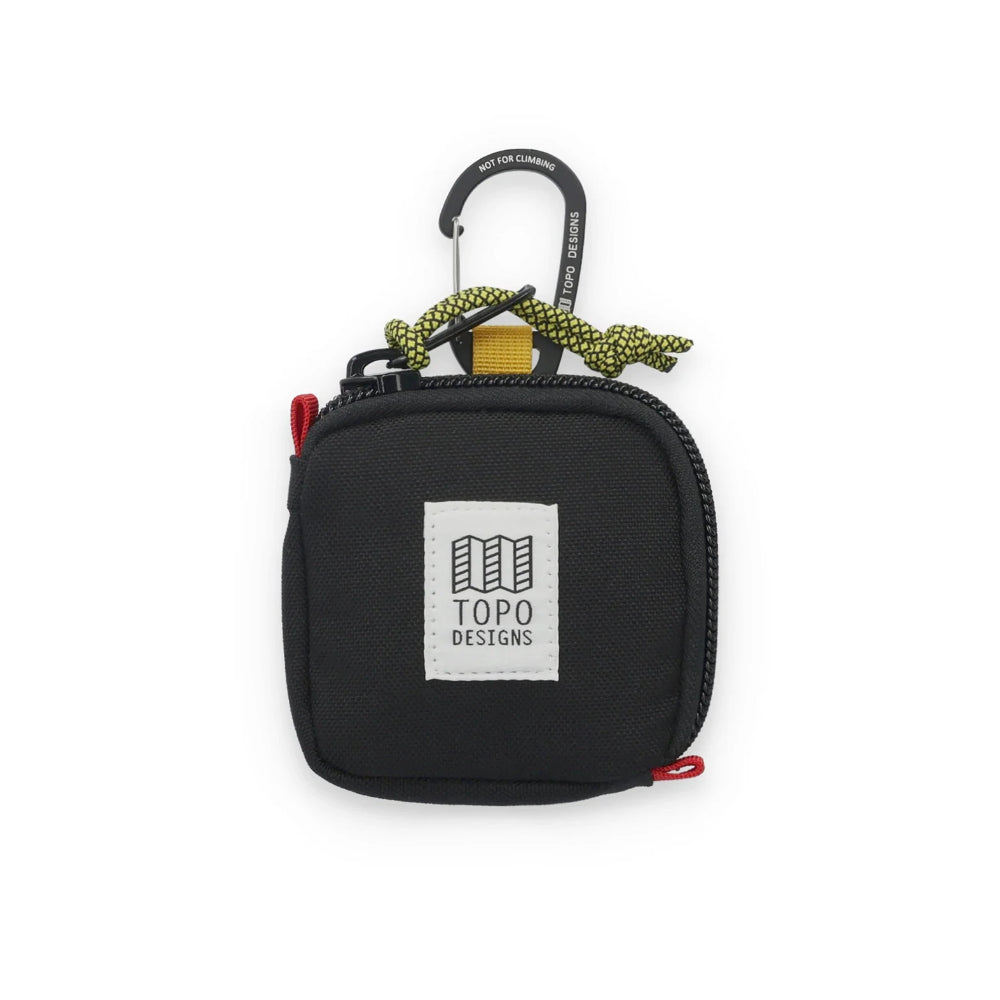 Topo Design Square Bag Black Front. This fun little clip bag is the perfect place to stash your headphones, cash and metro card as you rush to work.
