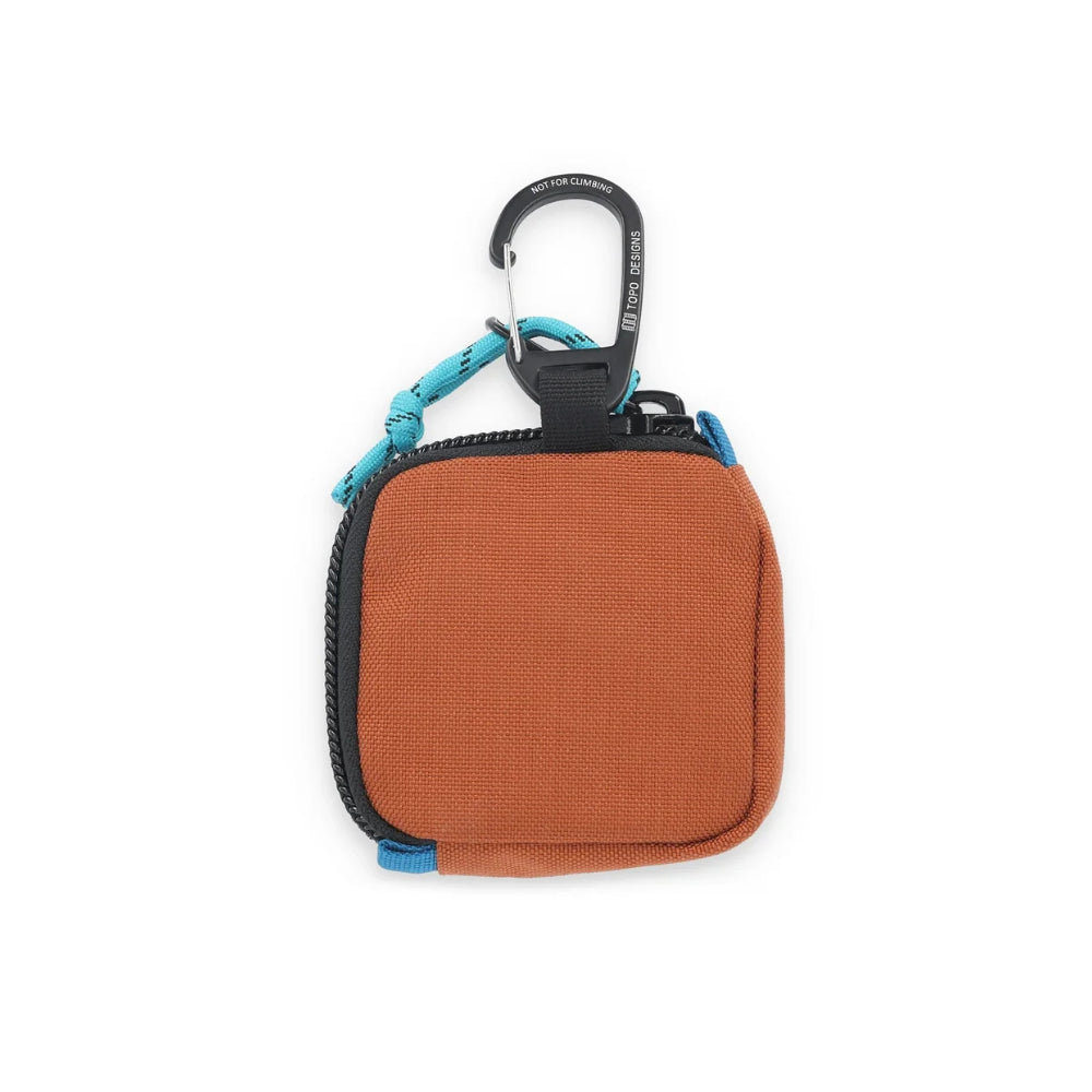 Topo Design Square Bag Clay Back. This fun little clip bag is the perfect place to stash your headphones, cash and metro card as you rush to work.