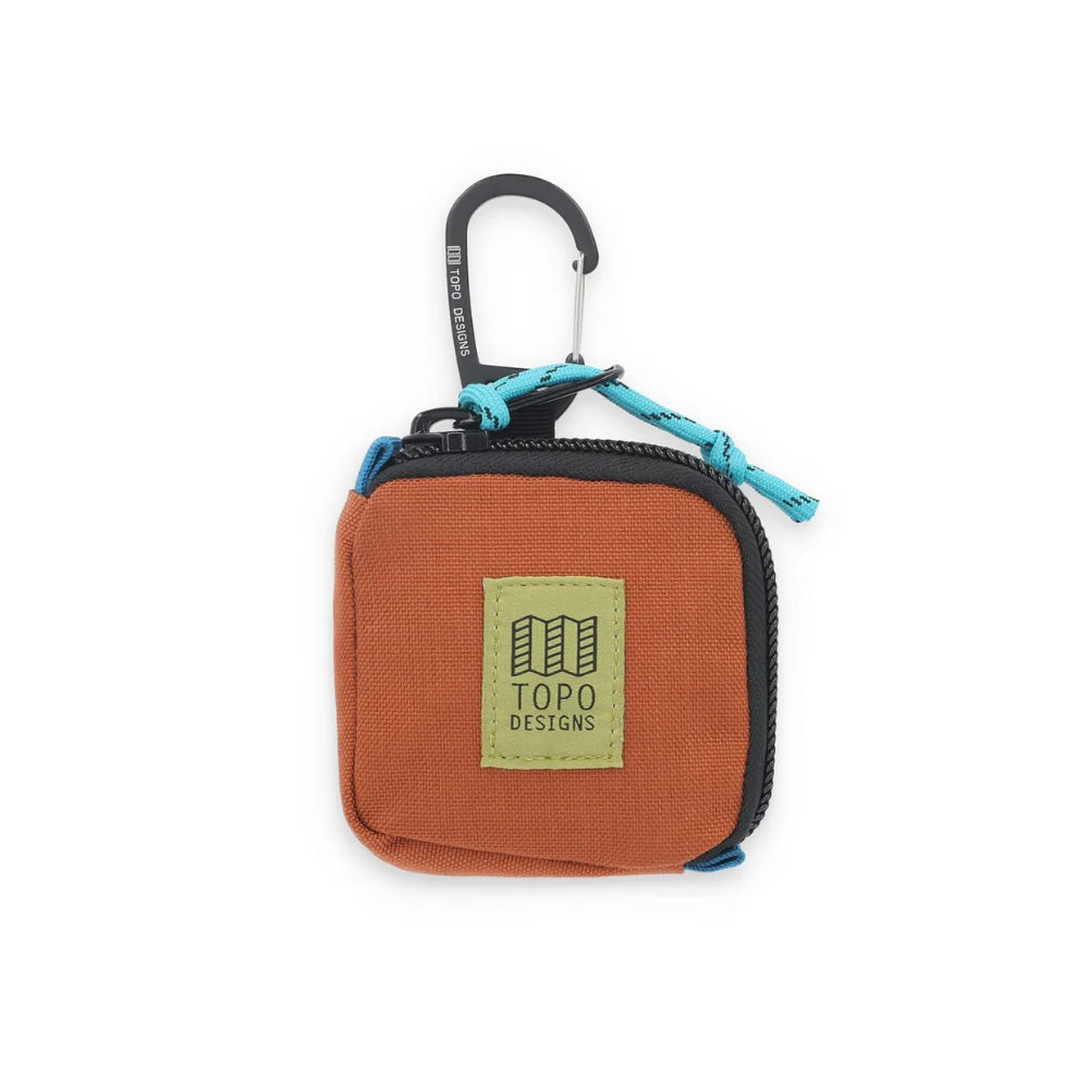 Topo Design Square Bag Clay Front. This fun little clip bag is the perfect place to stash your headphones, cash and metro card as you rush to work.