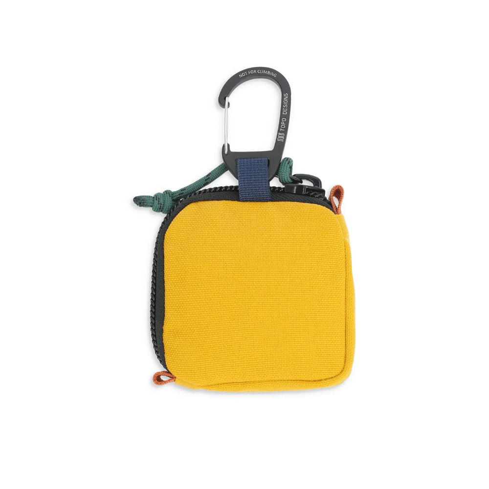 Topo Design Square Bag Mustard Back. This fun little clip bag is the perfect place to stash your headphones, cash and metro card as you rush to work.