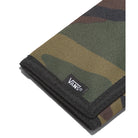 Vans Slipped Wallet Camo Featuring a retro, tri-fold design and a hook-and-loop closure that keeps contents secure, the heritage-inspired Slipped Wallet takes a cue from our footwear with iconic branding and prints. Inside, ample storage space includes a billfold, card slots, an ID window, and a coin pocket. Close Up